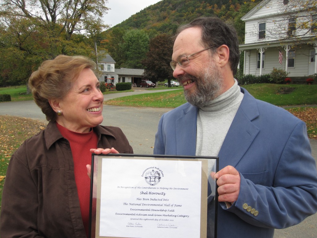 Shel Horowitz receives his membership in the National Environmental Hall of Fame from Judith Eiseman