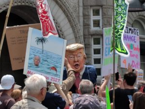 Climate marchers in front of Trump Hotel, Washington DC 4-29-17 (Clamshell Alliance's spiritual heirs)