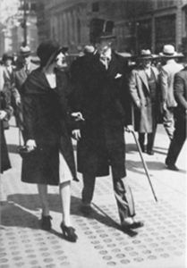 Edward Bernays' secretary Bertha Hunt smokes in public at Bernays' 1927 "Torches of Freedom" march