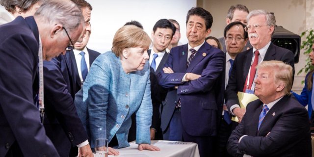 This photo released by the German government sums up the US president's attitude.