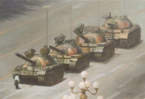 An unarmed man with a small flag stops four Chinese tanks in Tiannanmen Square, Beijing, 