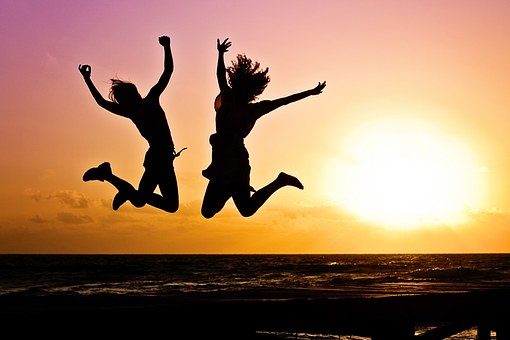 happy people leaping for joy
